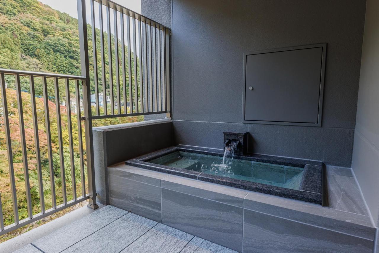 Отель Minakami Onsen Aratashi Минаками Экстерьер фото
