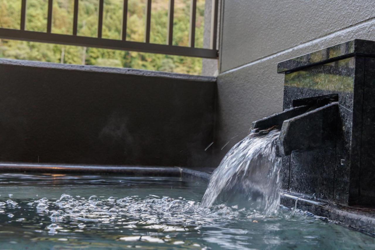 Отель Minakami Onsen Aratashi Минаками Экстерьер фото