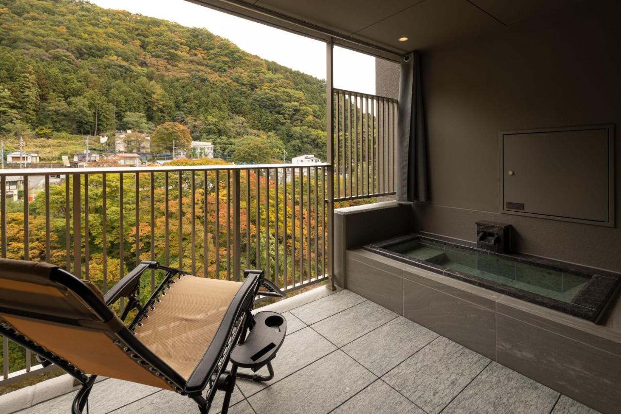 Отель Minakami Onsen Aratashi Минаками Экстерьер фото