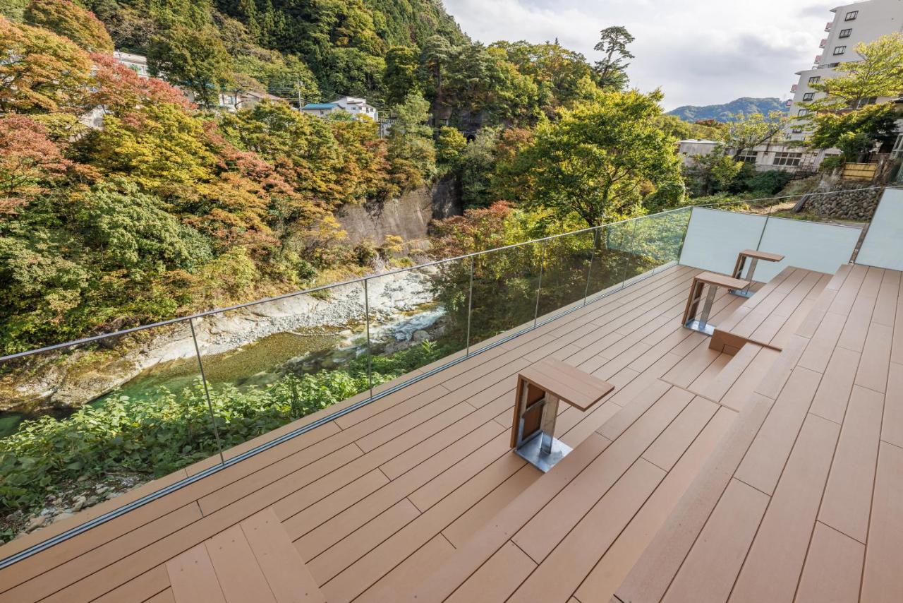 Отель Minakami Onsen Aratashi Минаками Экстерьер фото
