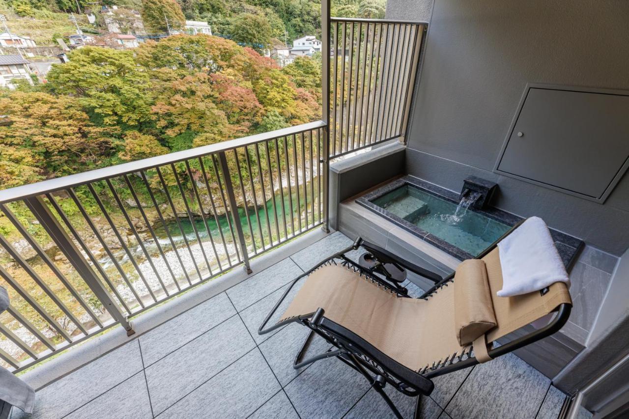 Отель Minakami Onsen Aratashi Минаками Экстерьер фото